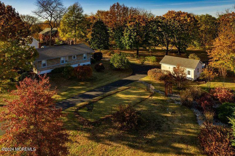 2149 Jacksonville Jobstown Road Jobstown, NJ 08041 - Photo 7 of 48 a backyard of a house with table and chairs