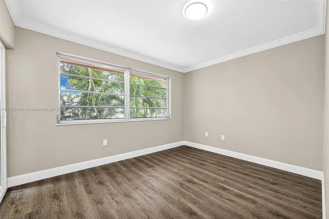 a view of balcony with yard