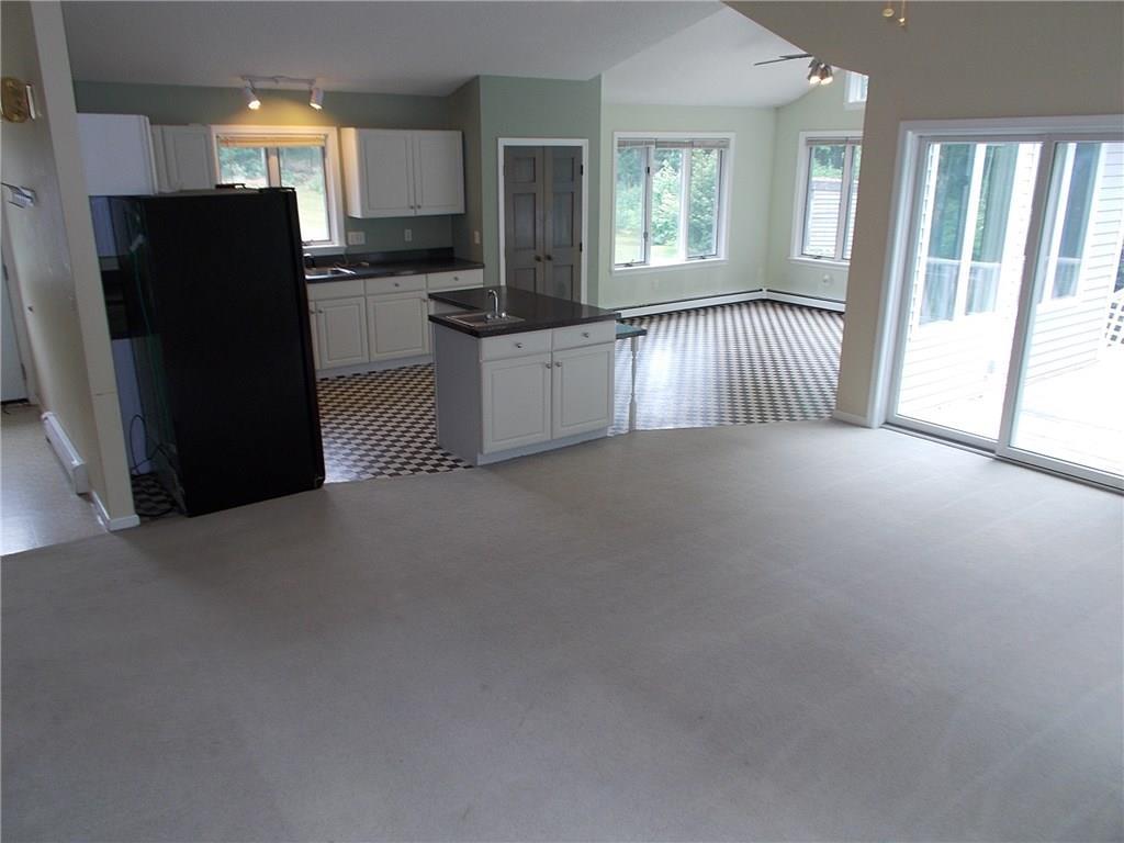 21 River Road Topsham, ME 04086 - Photo 5 of 13 Looking from the living room to the...