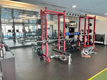 a view of a room with gym equipment