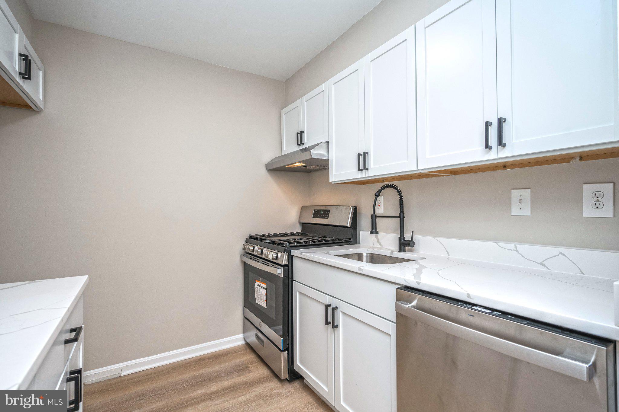 5908 Cove Landing Road, Unit 204 Burke, VA 22015 - Photo 12 of 32 Updated kitchen with quartz counters