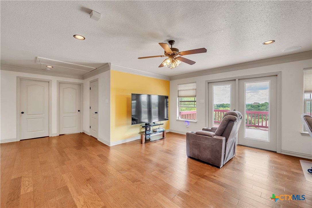4945 Water Works Road Belton, TX 76513 - Photo 17 of 36 a view of a livingroom with furniture and a ceiling fan