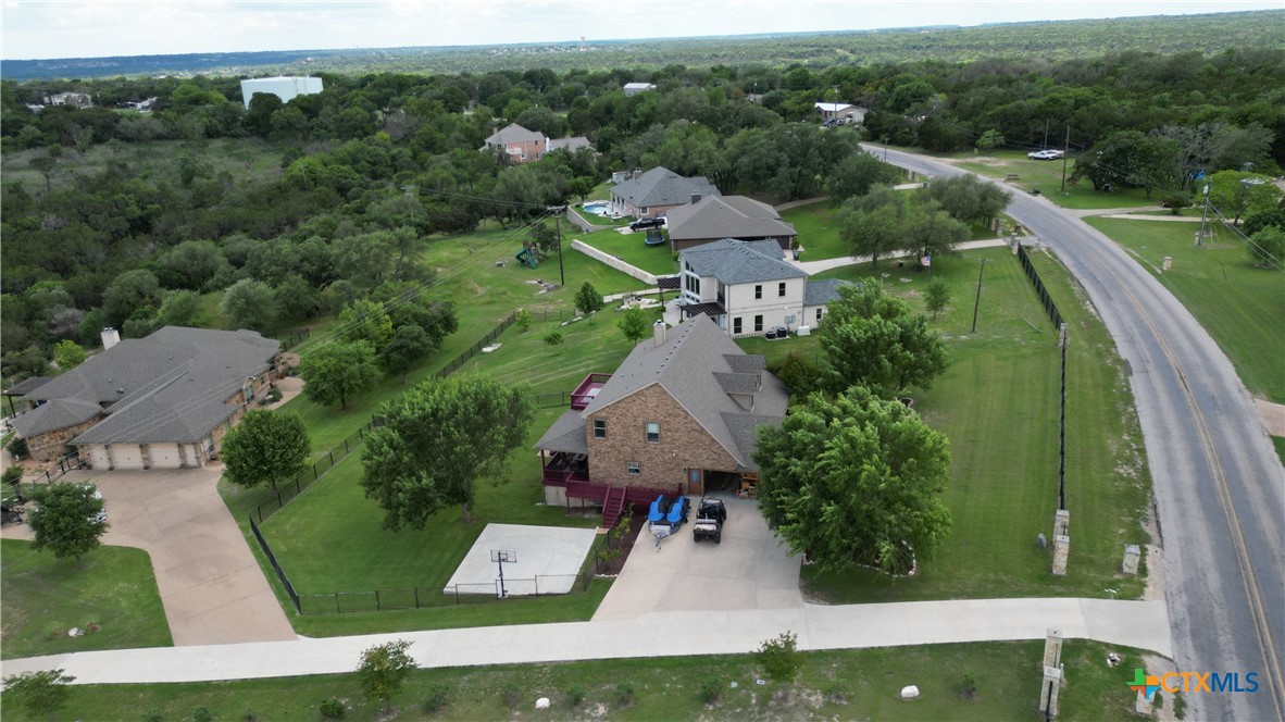 4945 Water Works Road Belton, TX 76513 - Photo 2 of 36 an aerial view of residential houses with outdoor space and trees