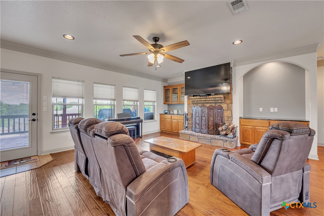 4945 Water Works Road Belton, TX 76513 - Photo 5 of 36 a living room with furniture and a wooden floor