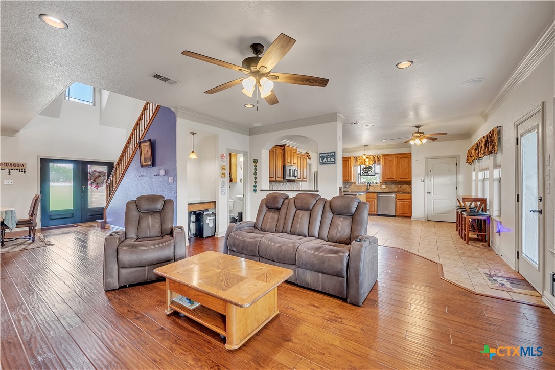 4945 Water Works Road Belton, TX 76513 - Photo 7 of 36 a living room with furniture and wooden floor