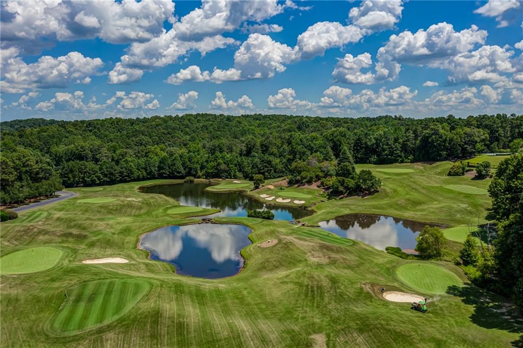 a view of a golf course with a fountain