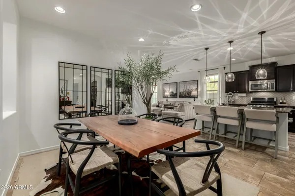 a view of a dining room with furniture