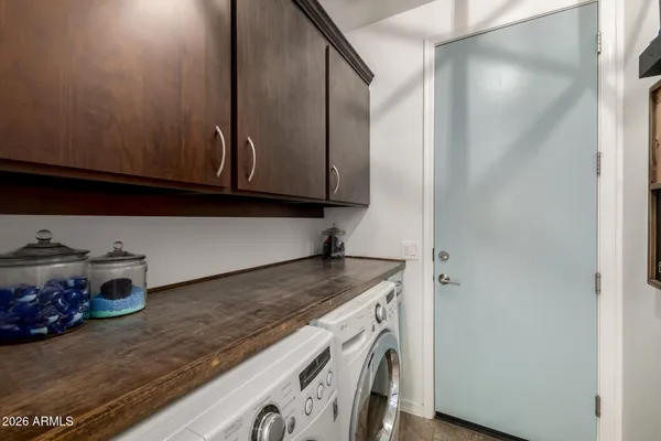a kitchen with a stove and a microwave