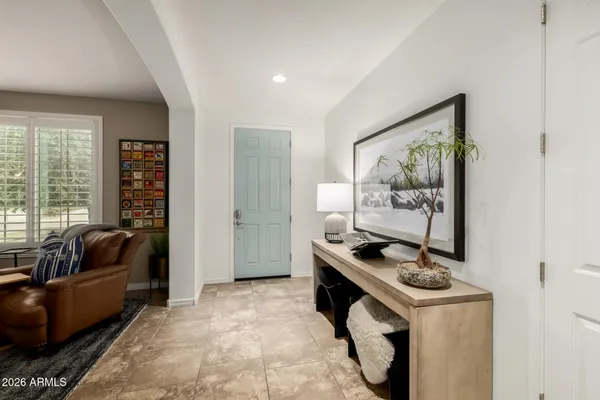 a kitchen with stainless steel appliances granite countertop a stove and a refrigerator