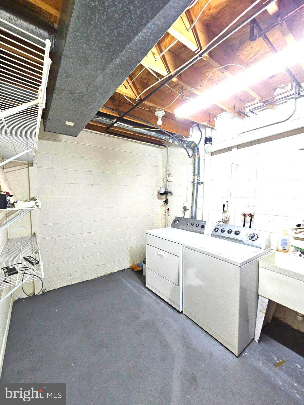 9737 Whiskey Run Laurel, MD 20723 - Photo 23 of 23 a utility room with dryer and washer