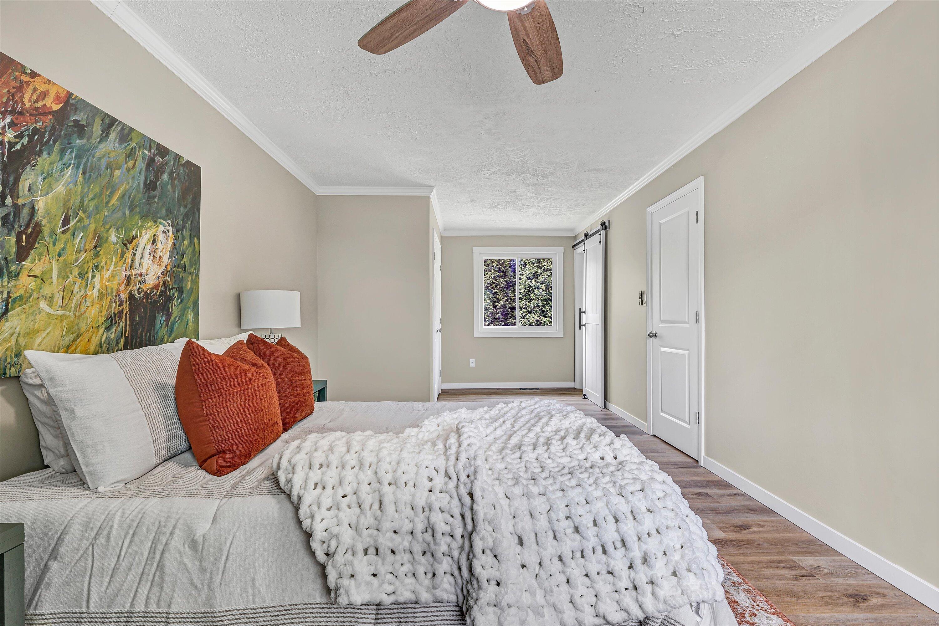 30 Grayson Street Rocky Mount, VA 24151 - Photo 17 of 29 a bedroom with a bed and a couch