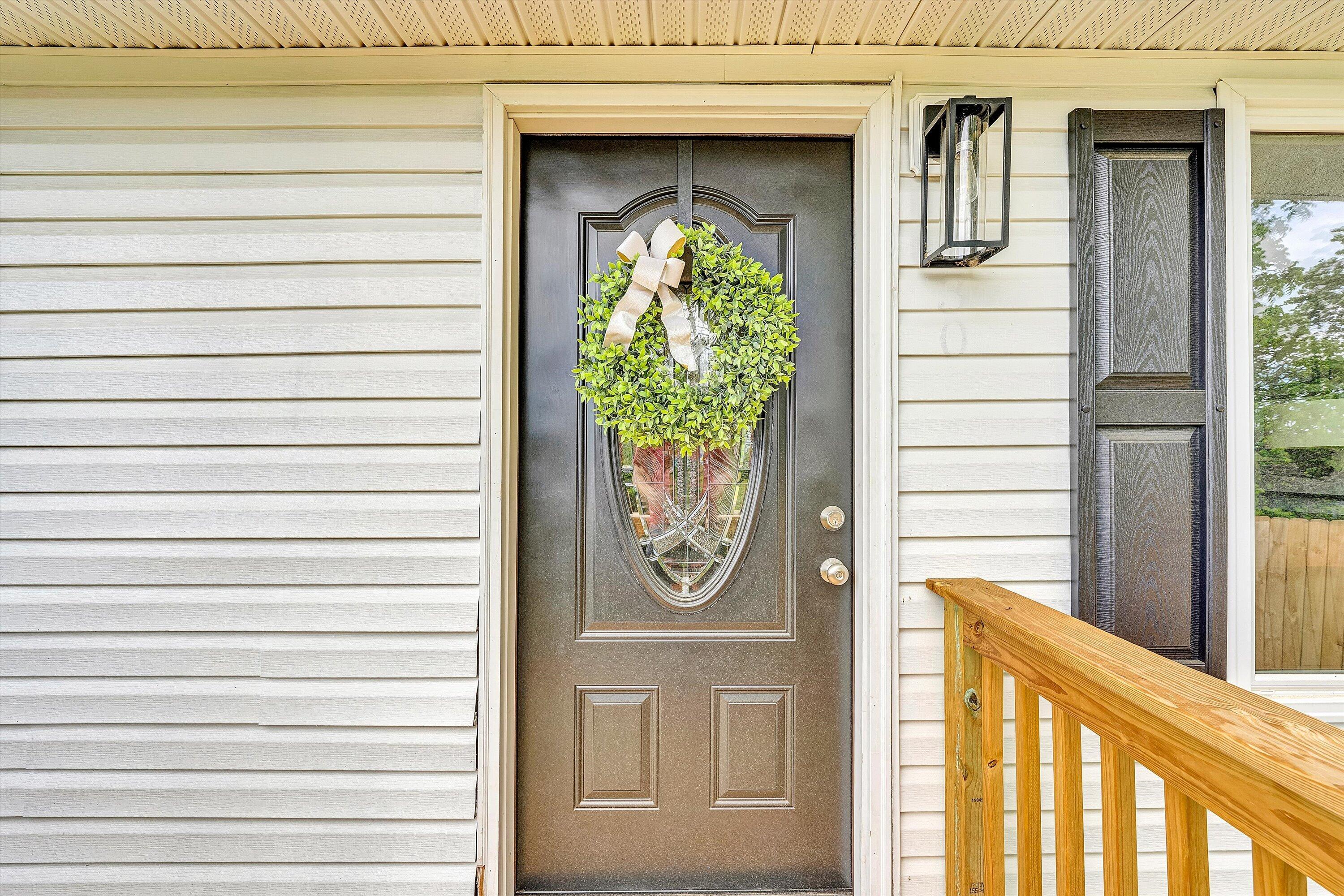 30 Grayson Street Rocky Mount, VA 24151 - Photo 4 of 29 a front view of a house with large windows and plants