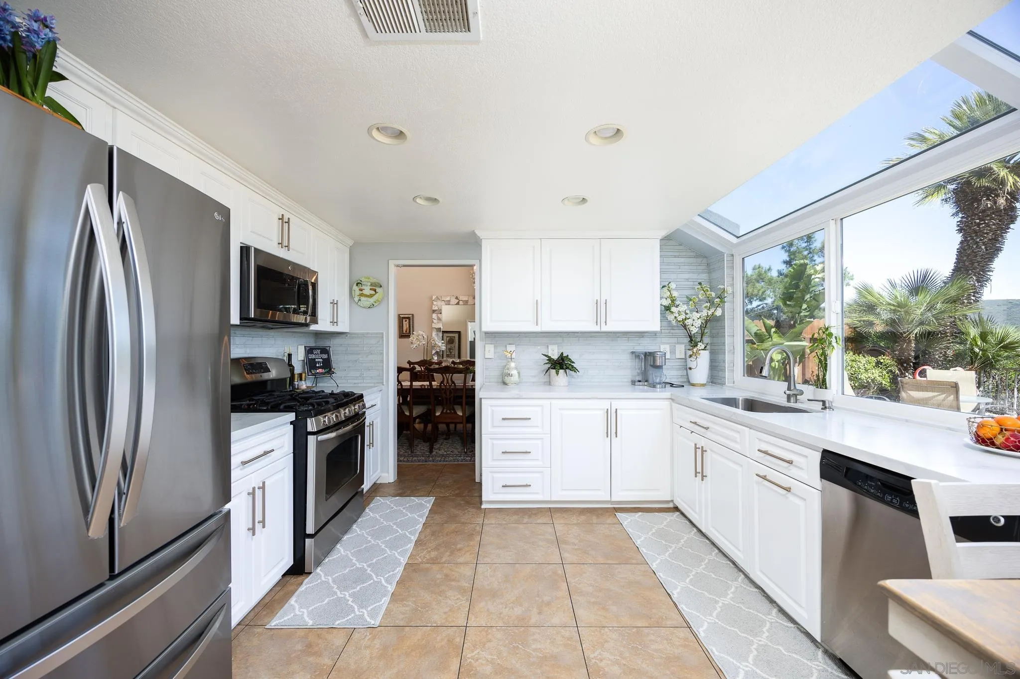 1373 Avenida Azul San Marcos, CA 92069 - Photo 11 of 33 a kitchen with a refrigerator stove and sink