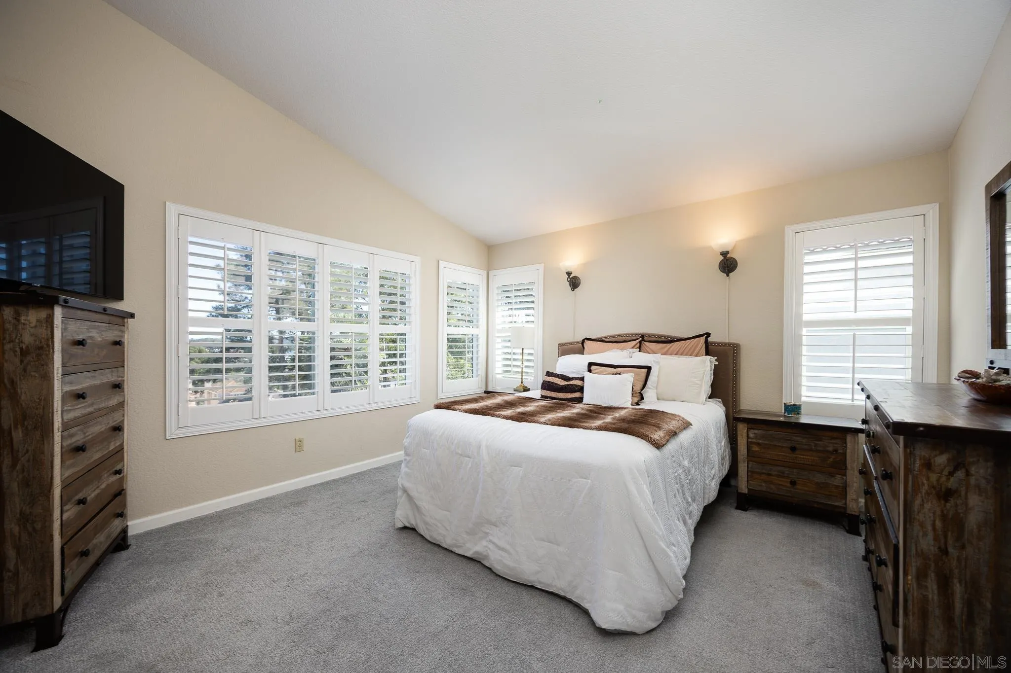 1373 Avenida Azul San Marcos, CA 92069 - Photo 14 of 33 a bed room with a bed and a television