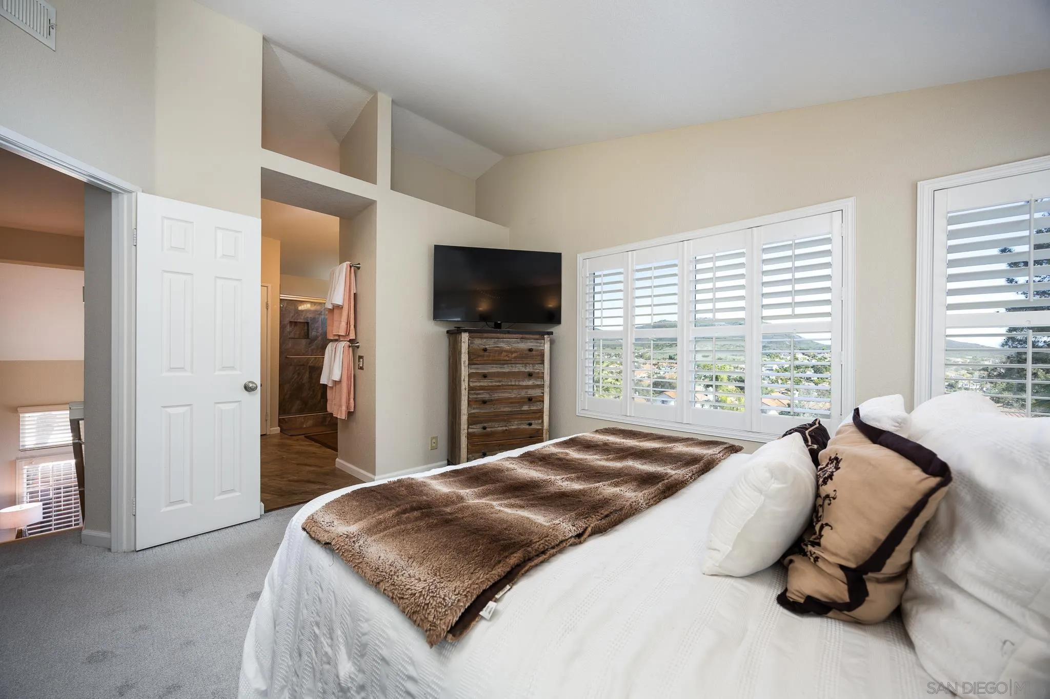 1373 Avenida Azul San Marcos, CA 92069 - Photo 15 of 33 a bed room with a bed and a television