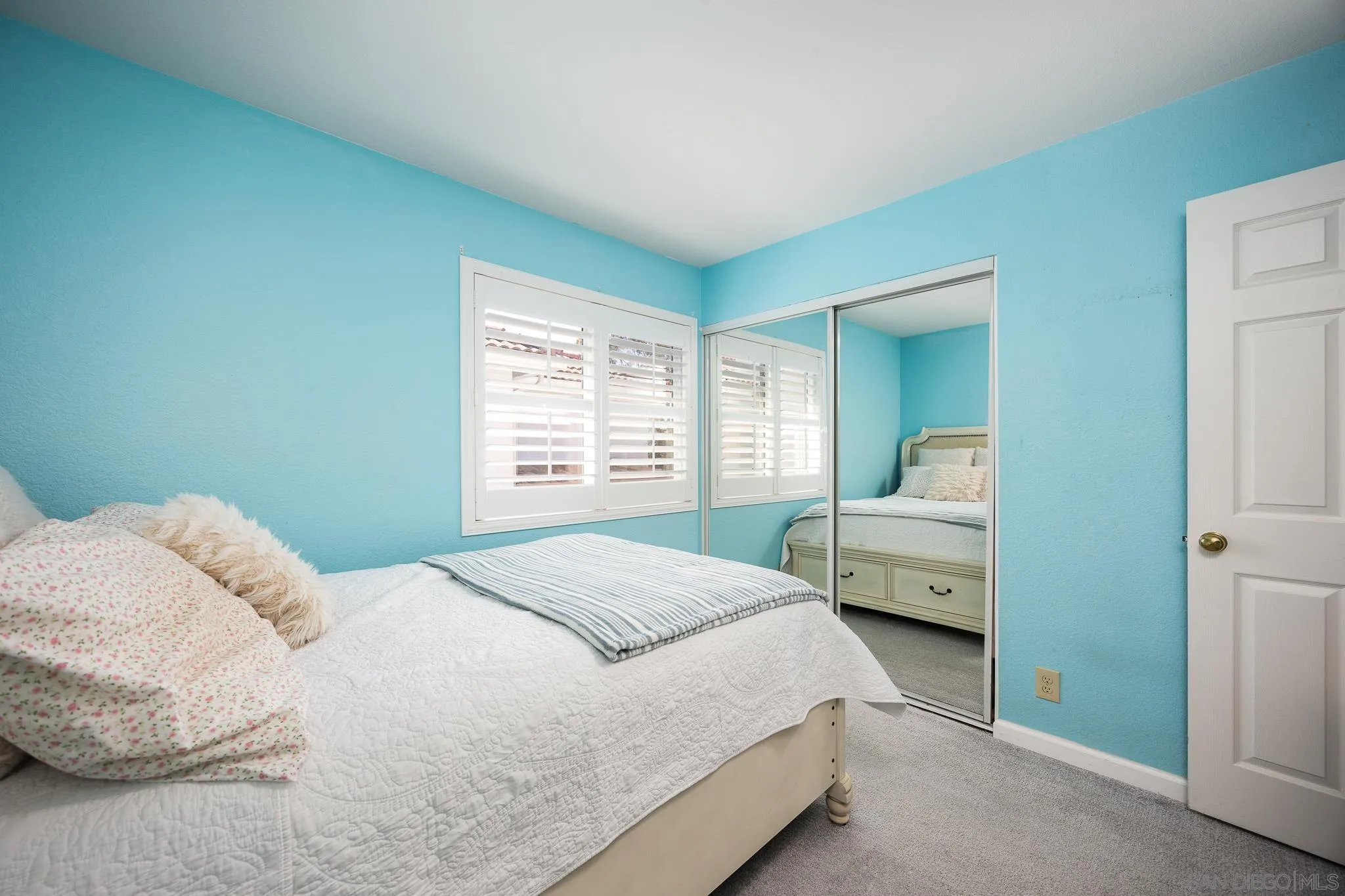 1373 Avenida Azul San Marcos, CA 92069 - Photo 20 of 33 a bedroom with a bed and a chair