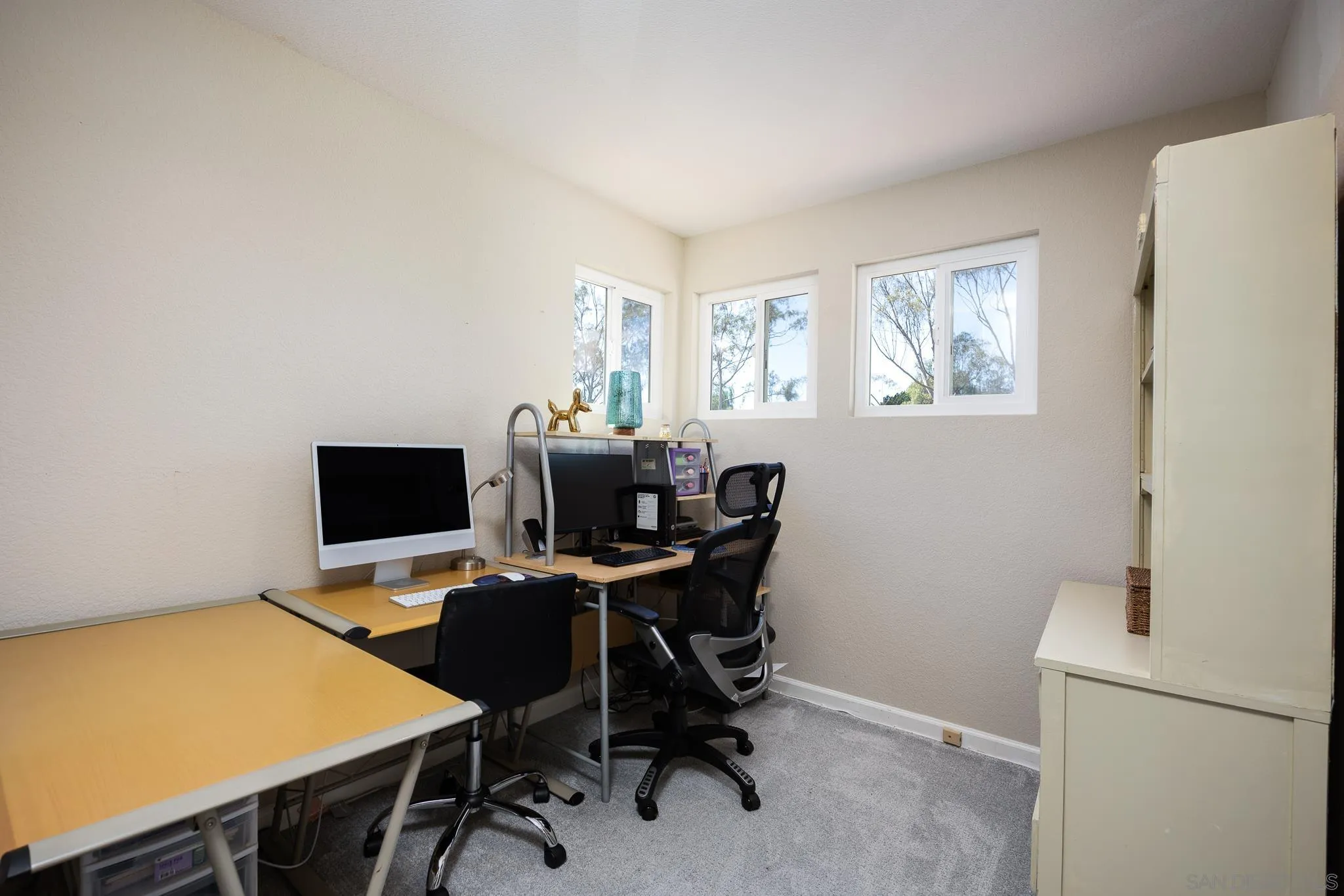 1373 Avenida Azul San Marcos, CA 92069 - Photo 21 of 33 a view of a workspace with furniture and a window