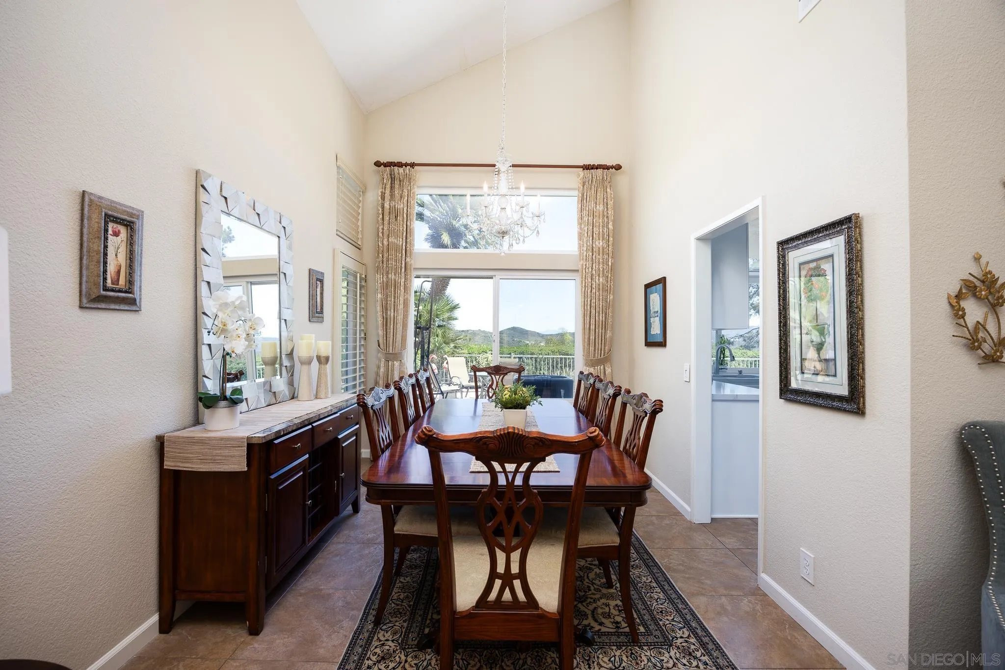 1373 Avenida Azul San Marcos, CA 92069 - Photo 7 of 33 a view of a dining room with furniture a rug and wooden floor
