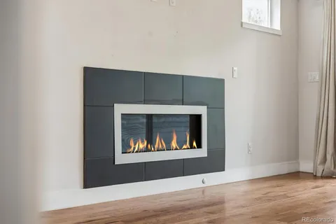 a living room with a fireplace