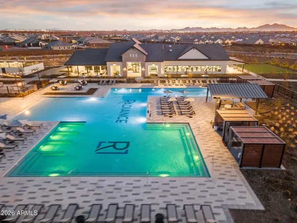 a view of a swimming pool with an ocean view