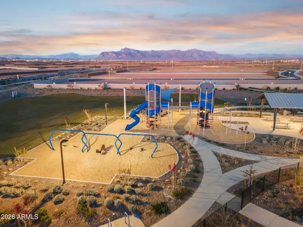 a living room with a couch and chairs