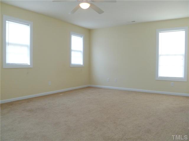 6040 Ladish Lane Raleigh, NC 27610 - Photo 14 of 21 an empty room with a window