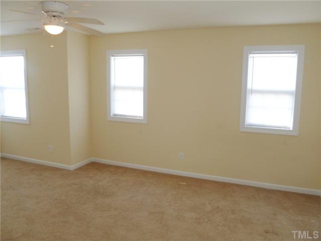6040 Ladish Lane Raleigh, NC 27610 - Photo 15 of 21 an empty room with a window