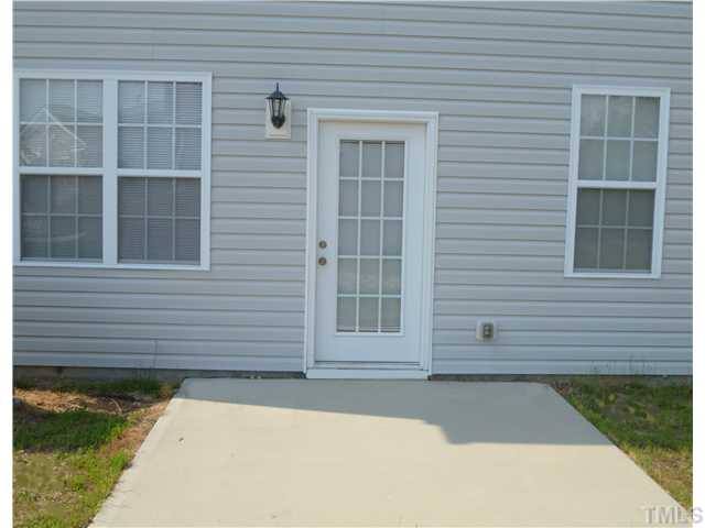 6040 Ladish Lane Raleigh, NC 27610 - Photo 21 of 21 a front view of a house having yard