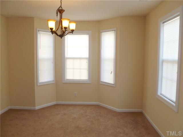 6040 Ladish Lane Raleigh, NC 27610 - Photo 6 of 21 an empty room with a window