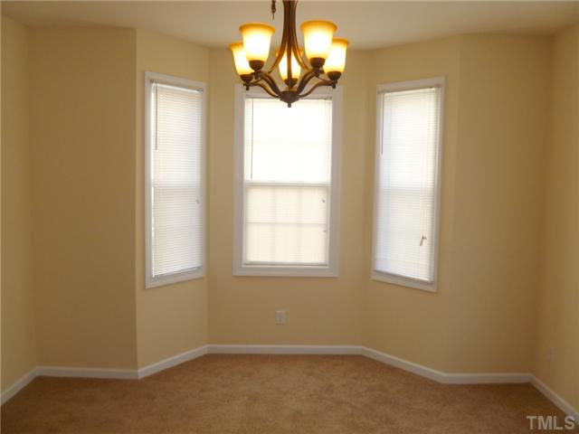 6040 Ladish Lane Raleigh, NC 27610 - Photo 7 of 21 an empty room with windows