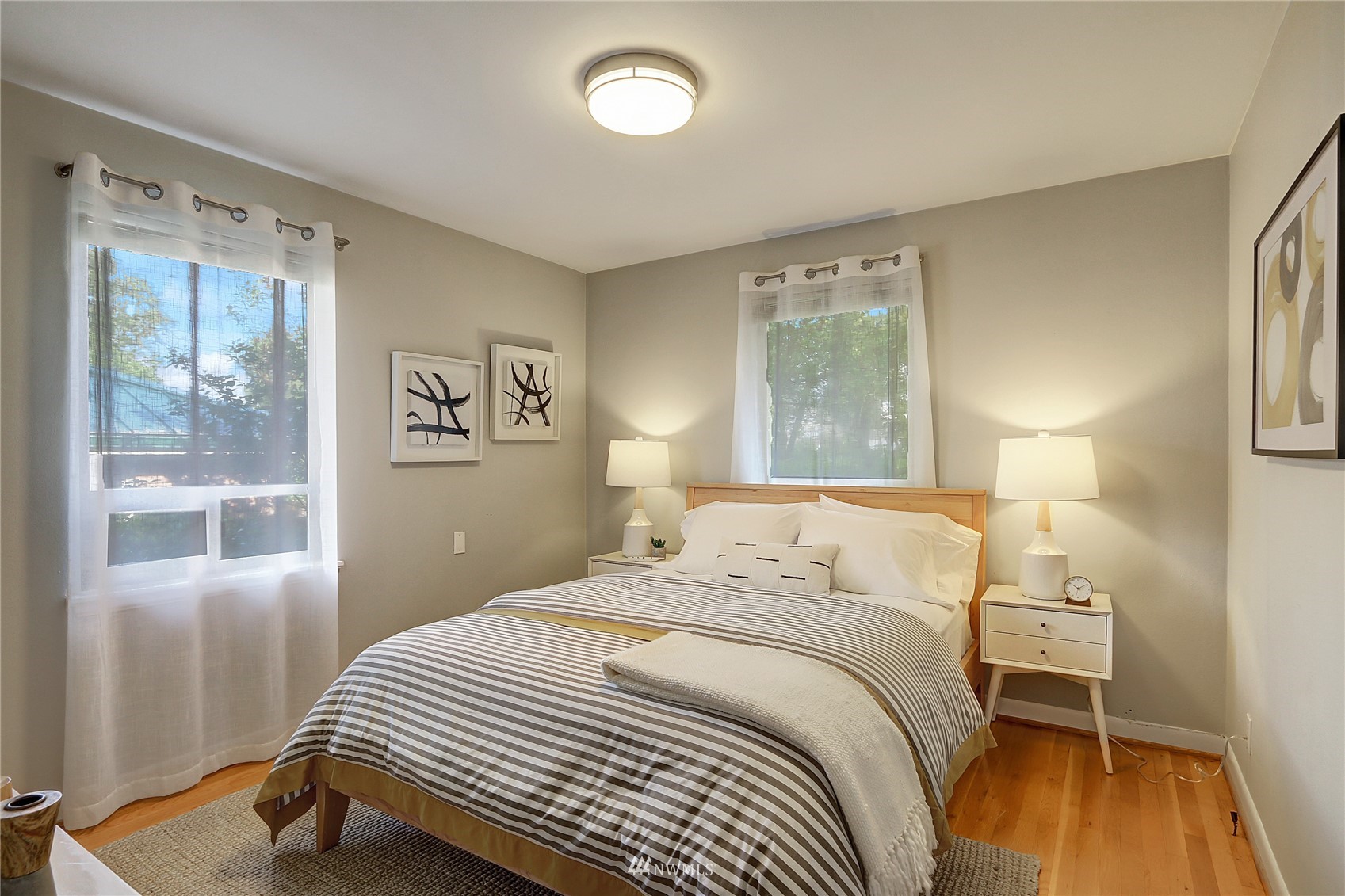 5217 South Myrtle Street Seattle, WA 98118 - Photo 18 of 30 a bedroom with a bed and a window