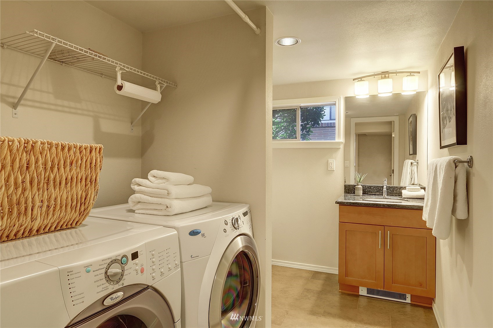5217 South Myrtle Street Seattle, WA 98118 - Photo 27 of 30 a view of a storage & utility room with washer and dryer