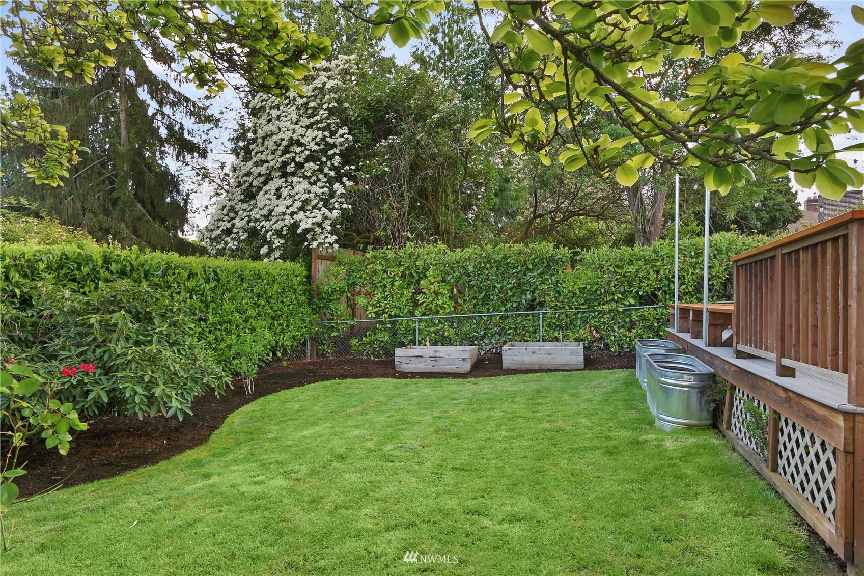 5217 South Myrtle Street Seattle, WA 98118 - Photo 29 of 30 a view of a backyard with sitting area