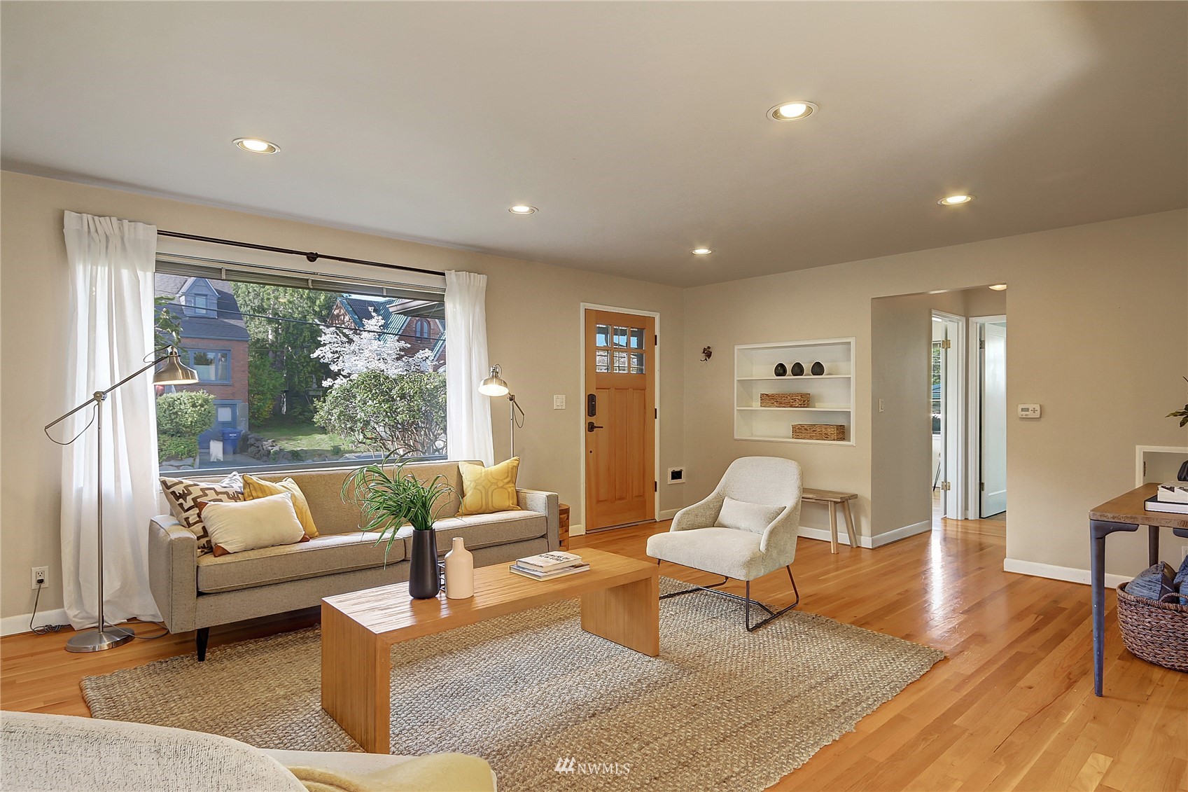 5217 South Myrtle Street Seattle, WA 98118 - Photo 4 of 30 a living room with furniture and a large window