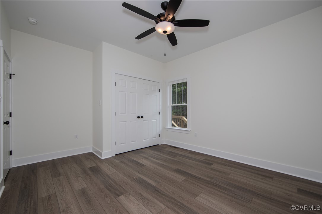 10500 Cross County Road Mineral, VA 23117 - Photo 23 of 27 wooden floor in an empty room with a window