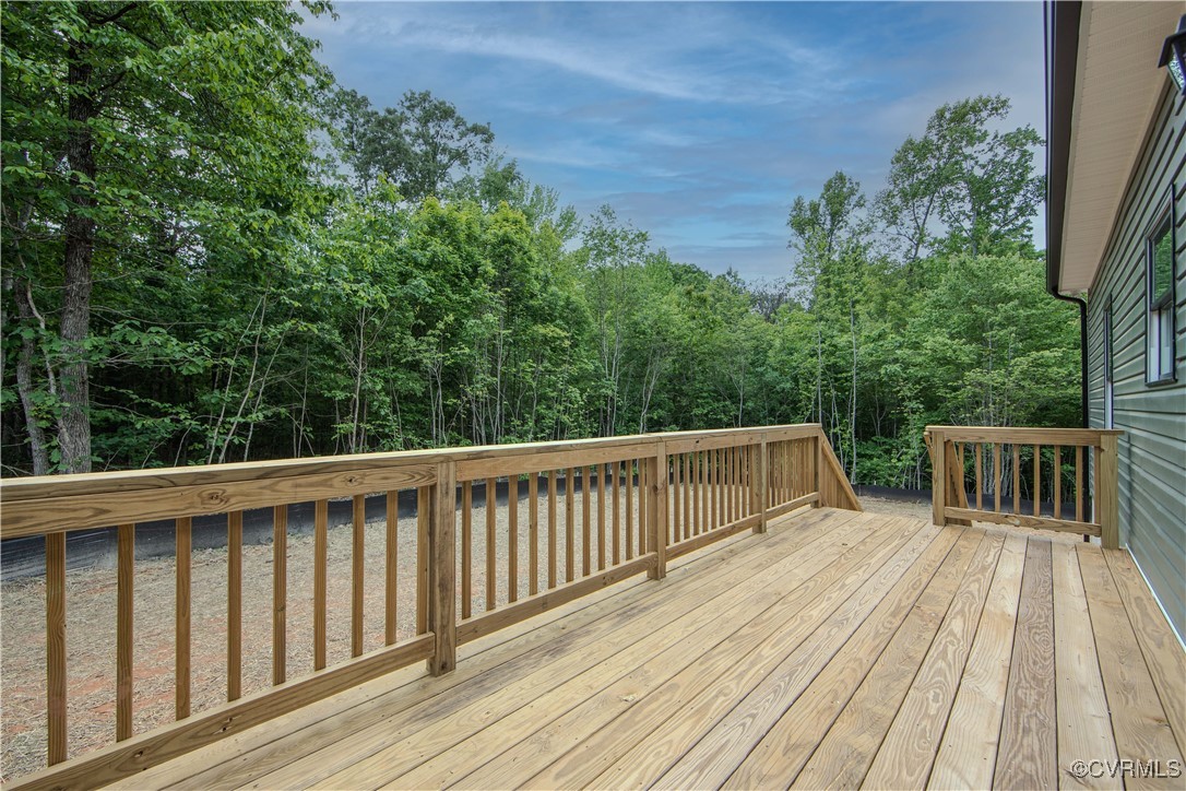 10500 Cross County Road Mineral, VA 23117 - Photo 25 of 27 a view of balcony with wooden floor and fence