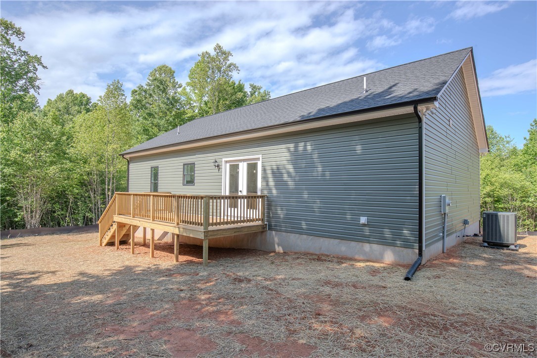 10500 Cross County Road Mineral, VA 23117 - Photo 4 of 27 a backyard of a house with a yard and outdoor seating