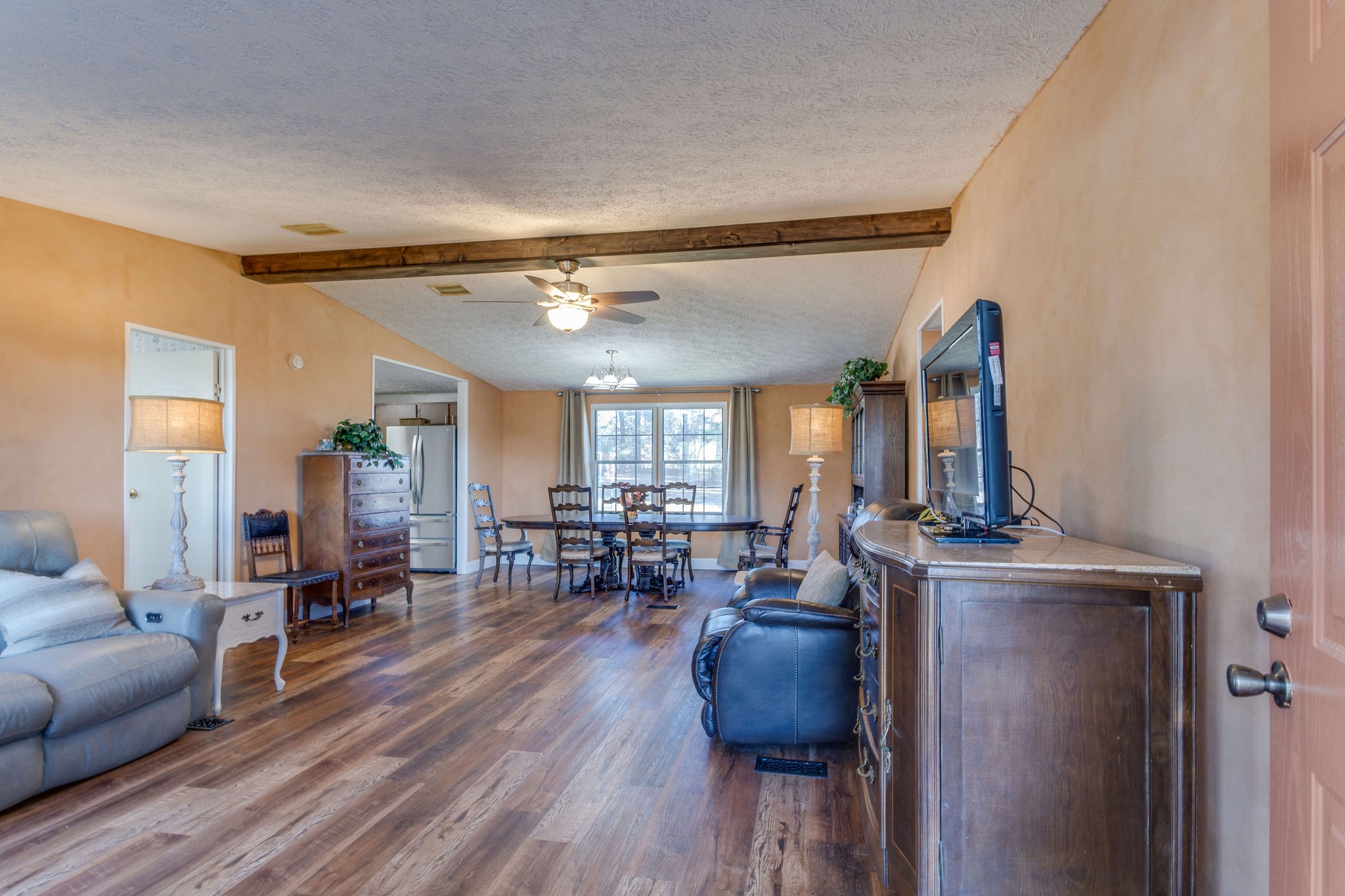 148 Stacy Road Manchester, TN 37355 - Photo 14 of 57 a living room with furniture and wooden floor