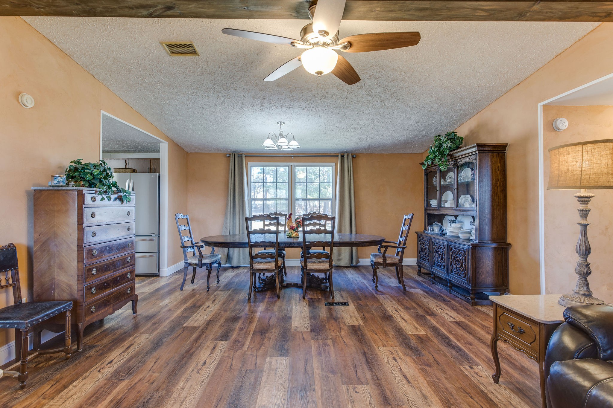 148 Stacy Road Manchester, TN 37355 - Photo 15 of 57 a view of a dining room with furniture window and wooden floor