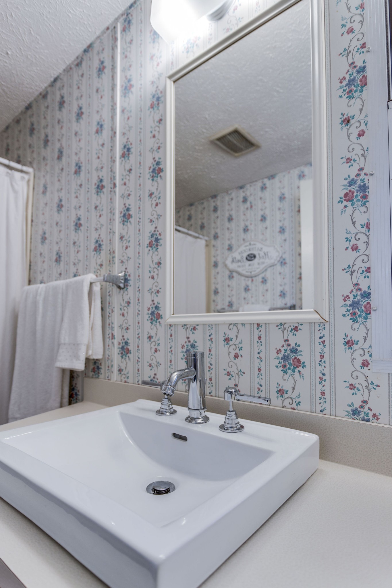 148 Stacy Road Manchester, TN 37355 - Photo 35 of 57 a bathroom with a sink and a mirror