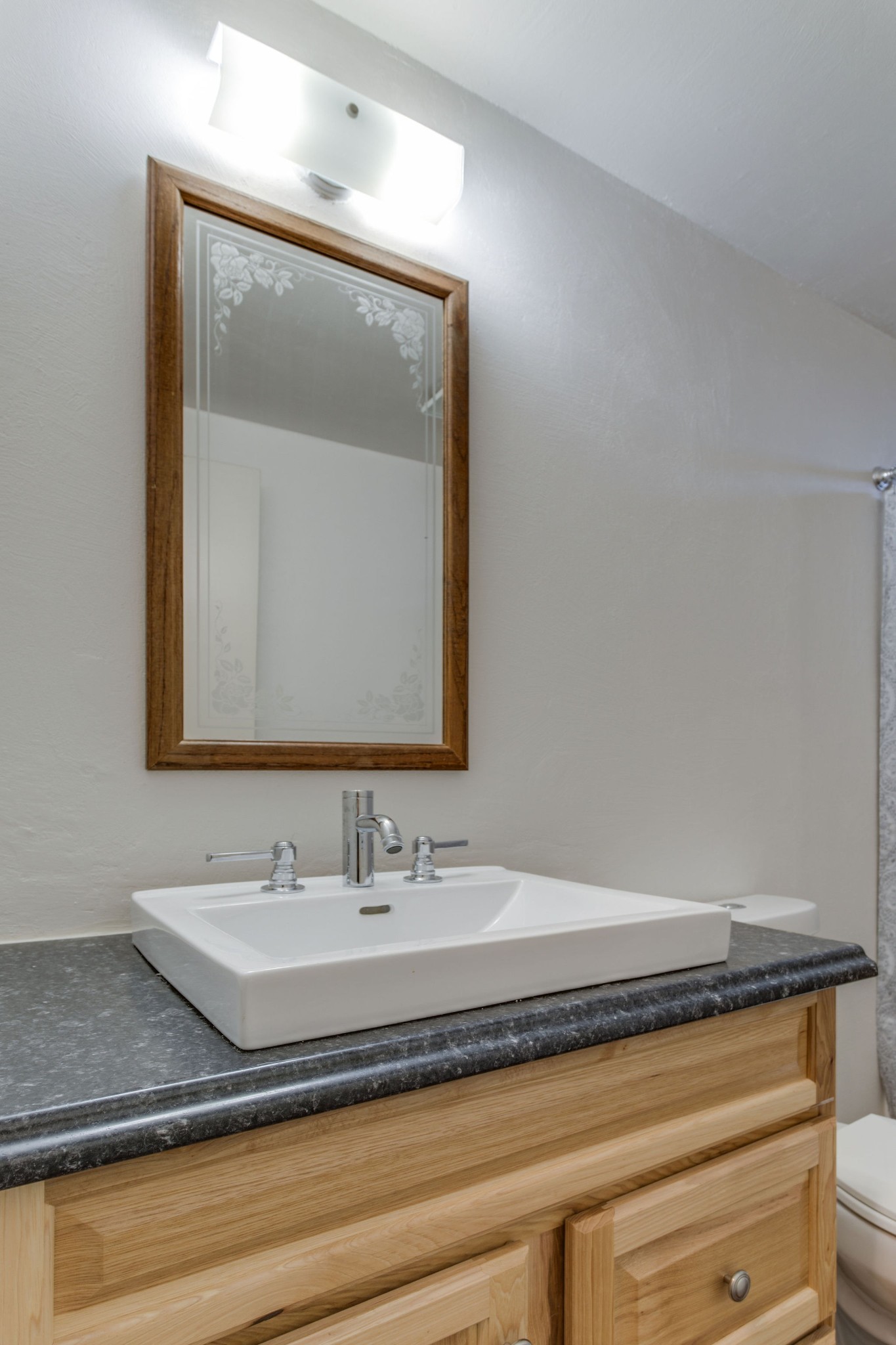 148 Stacy Road Manchester, TN 37355 - Photo 42 of 57 a bathroom with a sink and a mirror