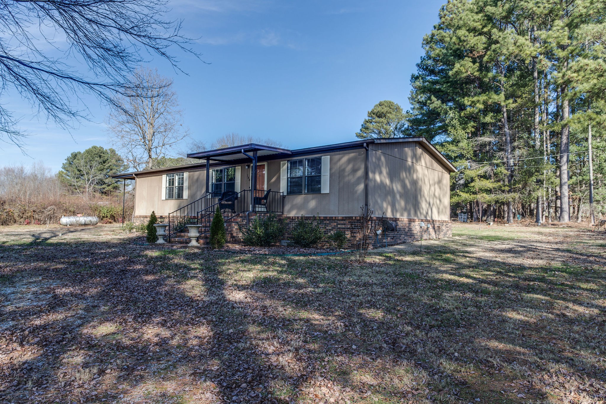 148 Stacy Road Manchester, TN 37355 - Photo 7 of 57 a view of a house with a yard