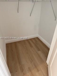 553 North West 39th Circle Boca Raton, FL 33431 - Photo 20 of 25 a view of a room with racks on the wall