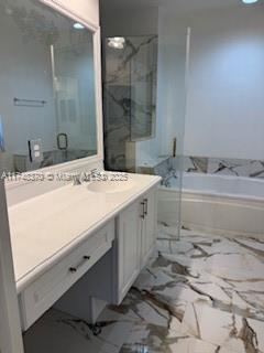 553 North West 39th Circle Boca Raton, FL 33431 - Photo 5 of 25 a bathroom with a sink toilet and shower