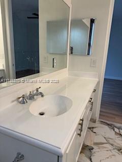 553 North West 39th Circle Boca Raton, FL 33431 - Photo 7 of 25 a bathroom with a sink and a mirror