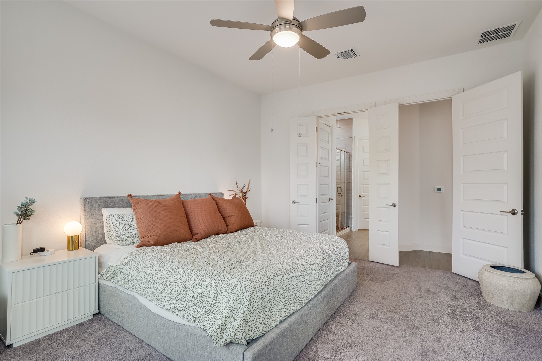 4701 Sea Salt Drive Austin, TX 78747 - Photo 15 of 29 a bedroom with a bed and a lamp
