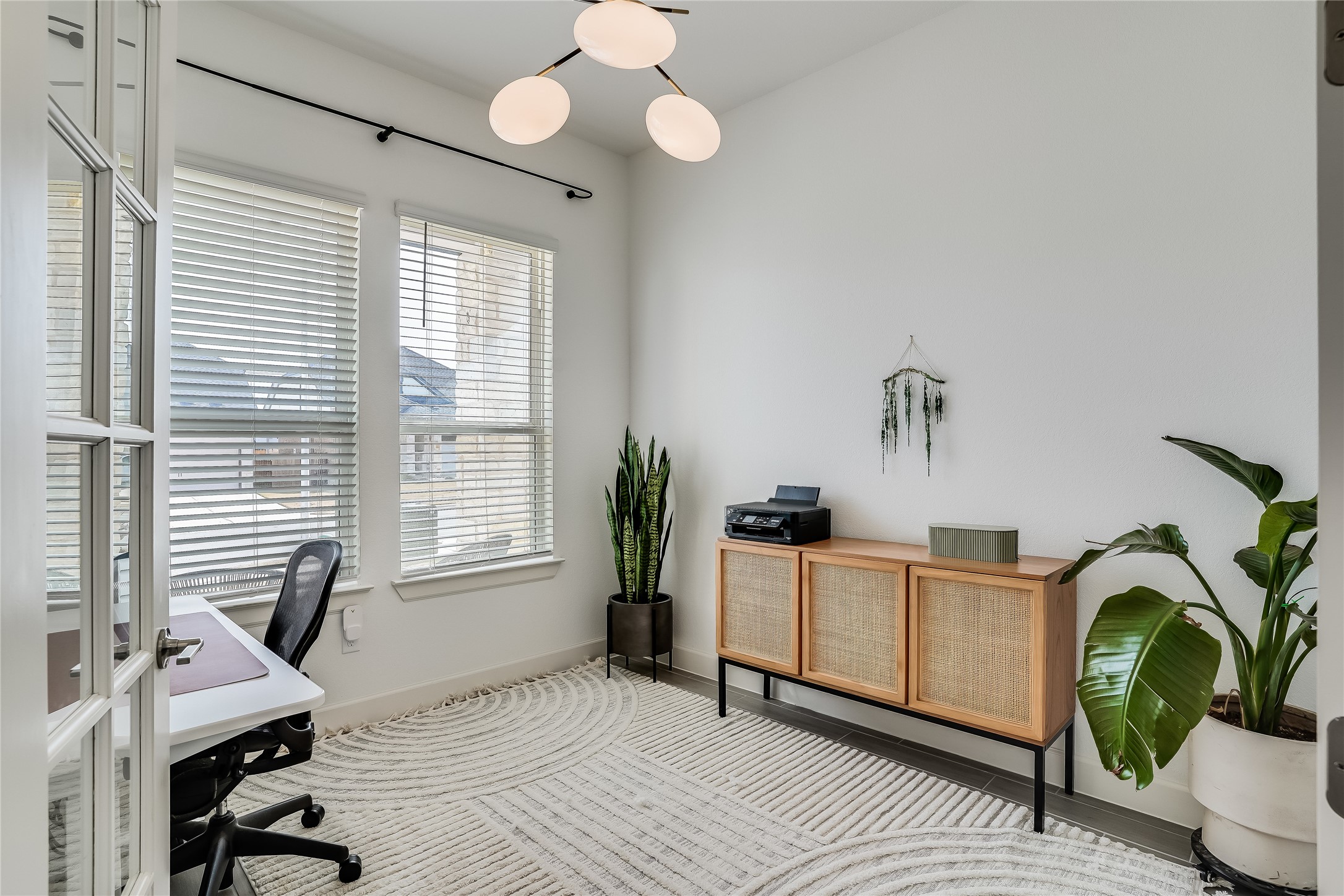 4701 Sea Salt Drive Austin, TX 78747 - Photo 21 of 29 a view of a workspace with furniture and a window