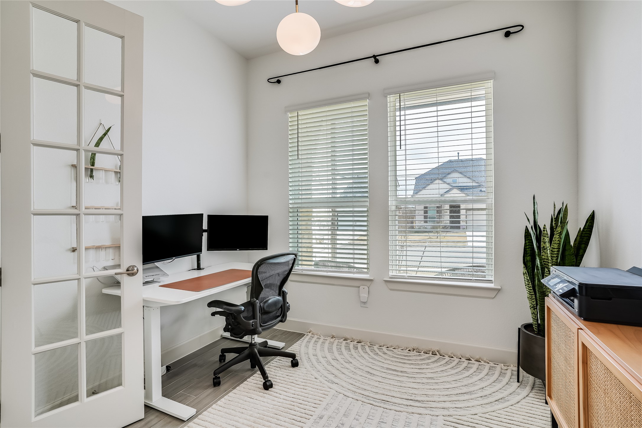 4701 Sea Salt Drive Austin, TX 78747 - Photo 22 of 29 a view of a workspace with furniture and a window