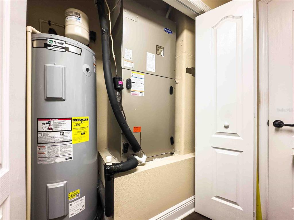 Undisclosed Address Spring Hill, FL 34608 - Photo 31 of 39 a view of water heater room