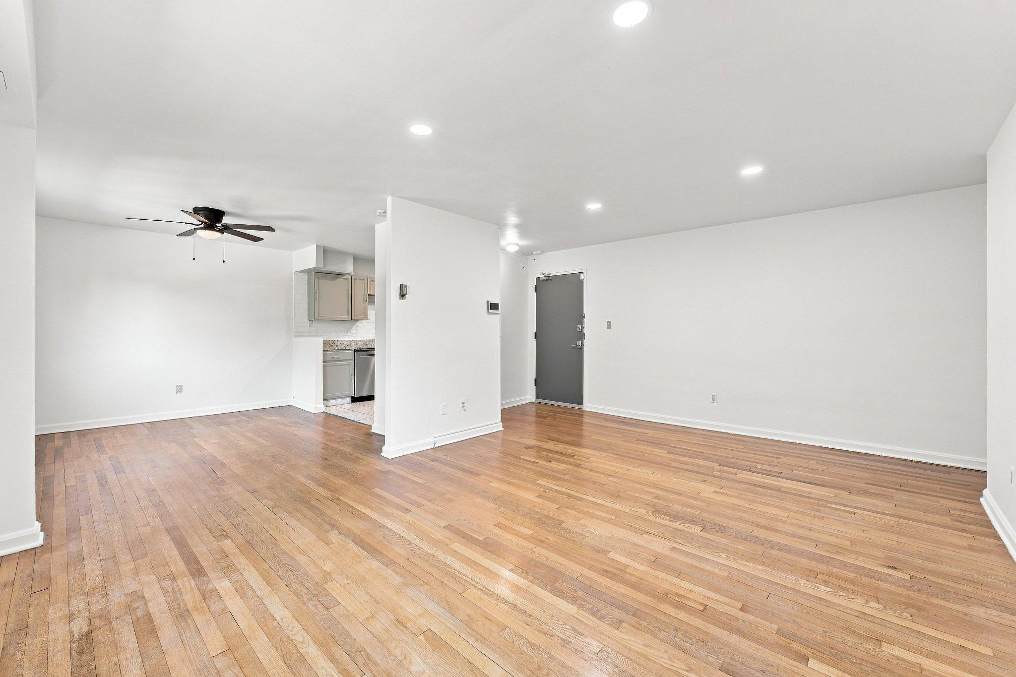 95 East Wayne Avenue, Unit 212 Silver Spring, MD 20901 - Photo 2 of 30 Living room and dining area